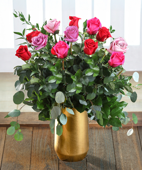 Farm-fresh luxury 'Love & Romance' Ecuadorian Mountain Roses featuring our 30% Larger Red, Pink, and Hot Pink Colors in a chic vase.