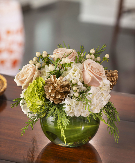 Winter Blush Bouquet featuring peach hydrangea, roses, magnolia, orchids and pepperberry