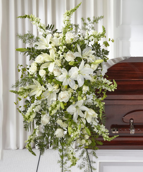 Loving Thoughts Standing Sympathy Spray featuring white garden flowers