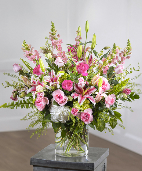 Pink Garden Sympathy Vase Arrangement featuring hydrangea, roses, snapdragons and seasonal foliage
