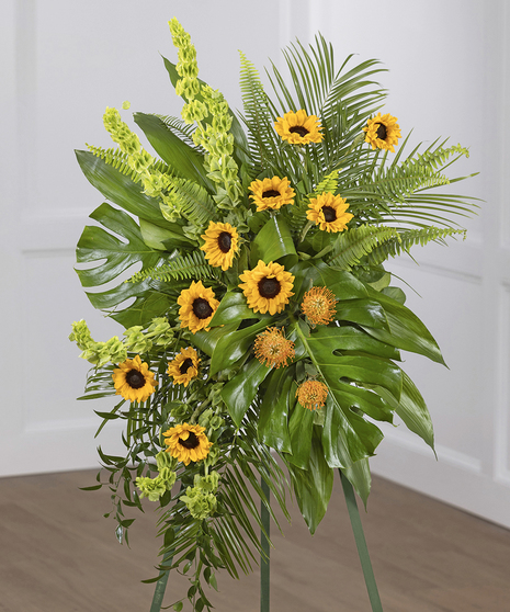 Sunflower Garden Sympathy Spray on a standing easel