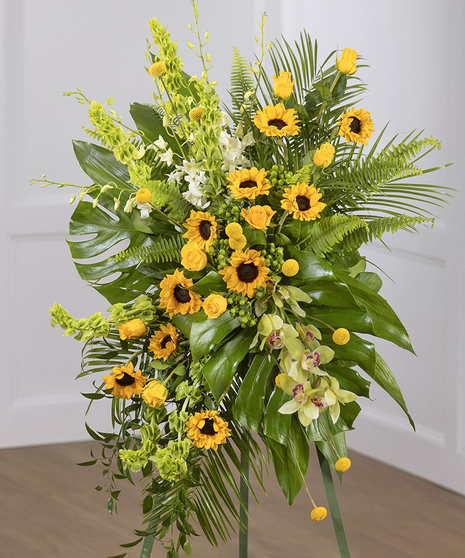 Sunflower Garden Sympathy Spray on a standing easel