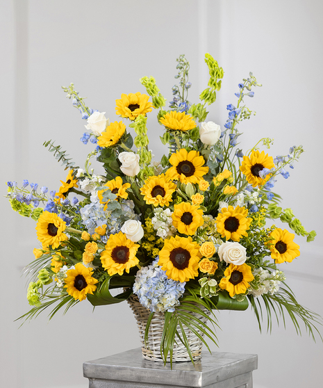Sunflower Garden Sympathy Basket featuring sunflowers, hydrangea, and eucalyptus