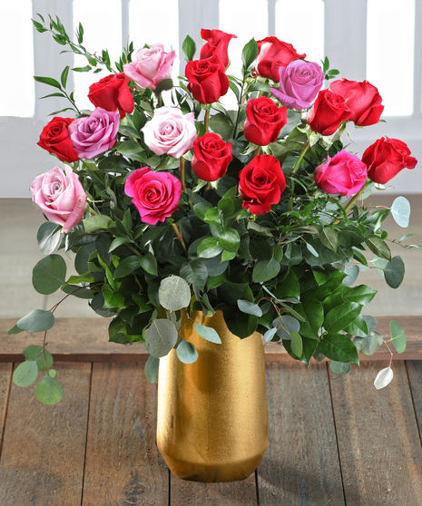 Farm-fresh luxury 'Love & Romance' Ecuadorian Mountain Roses featuring our 30% Larger Red, Pink, and Hot Pink Colors in a chic vase.