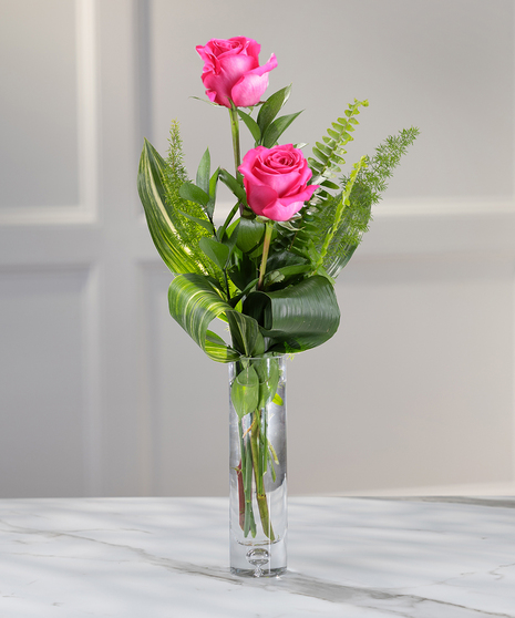Hot Pink Rose Budvases, select your choice of single, double or triple roses.